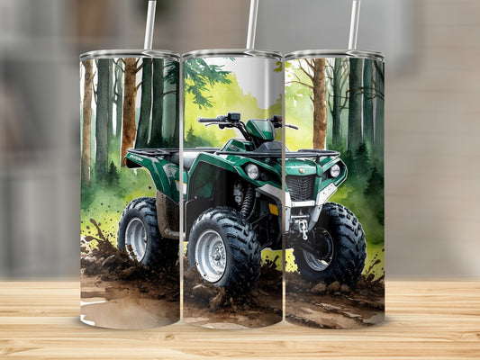 Green ATV riding through muddy forest terrain on a tumbler.