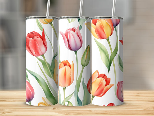 Three tumblers with a watercolor tulip floral pattern.