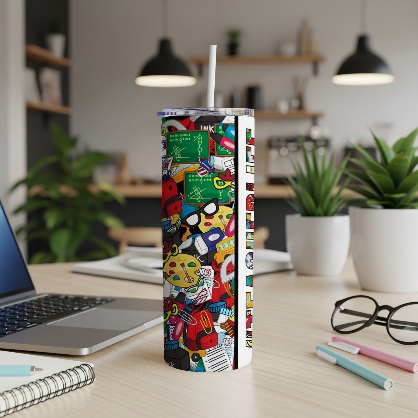 Tall tumbler with a colorful, doodle-style pattern featuring school supplies.