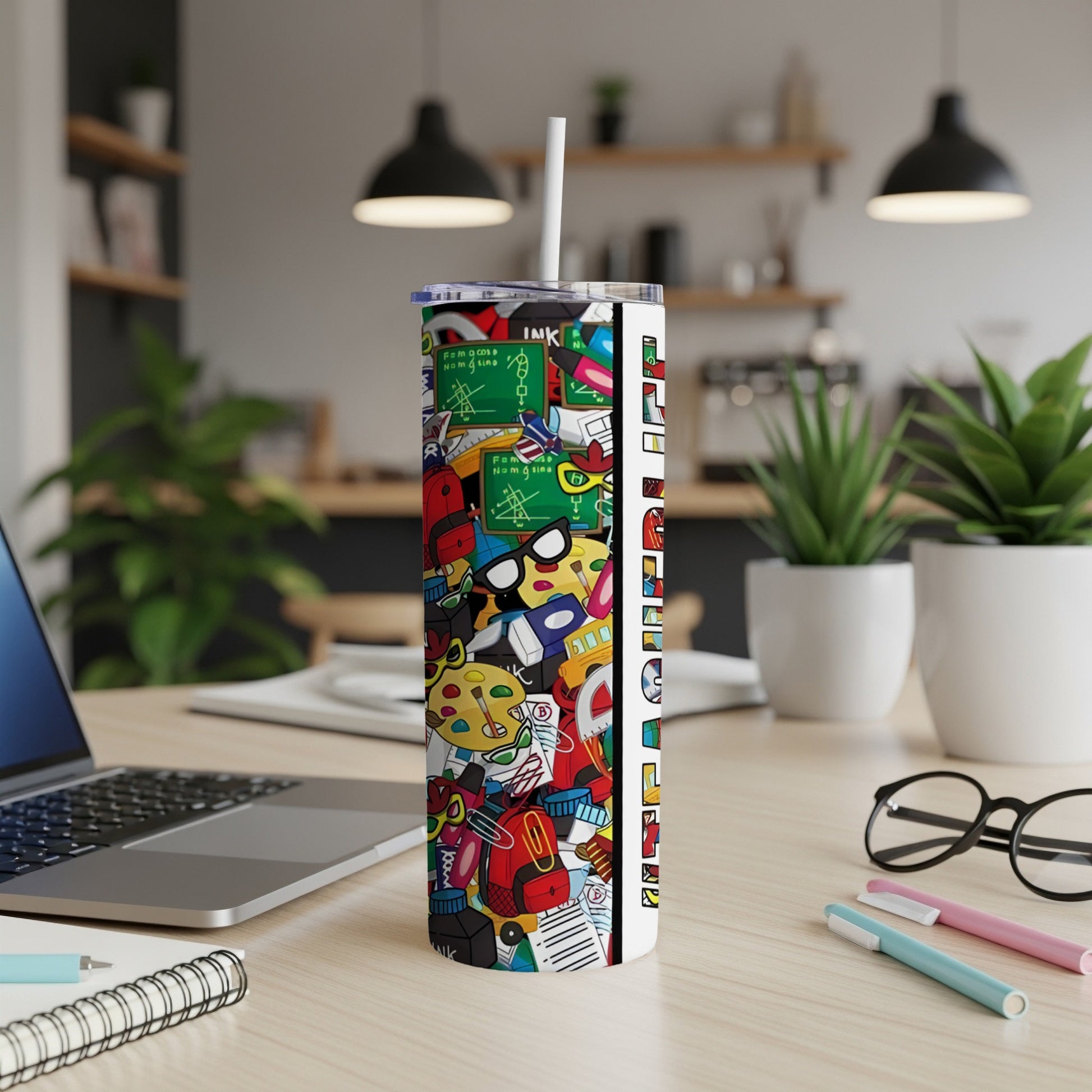 Tall tumbler with a colorful, doodle-style pattern featuring school supplies.