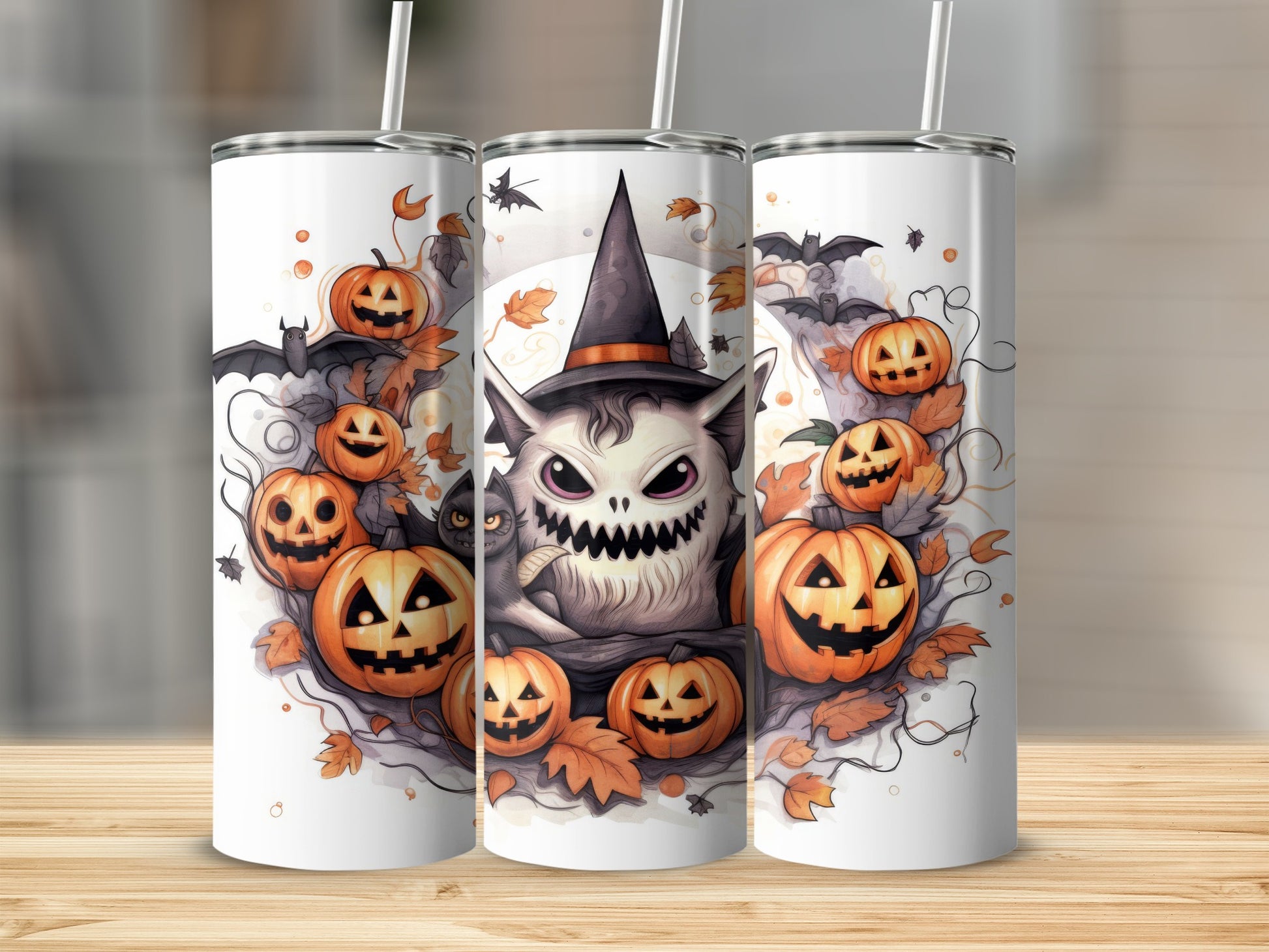 Halloween tumbler with monster, pumpkins, bats, and autumn leaves design.