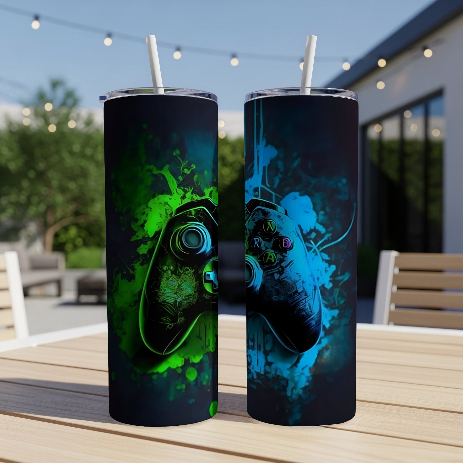 Two tumblers with video game controller graphics, one green, one blue.