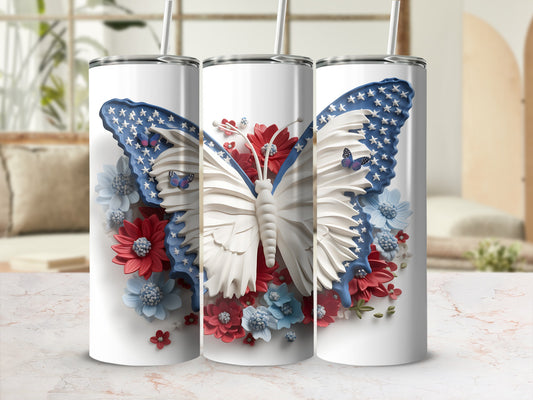 White tumbler with a patriotic butterfly and red and blue flowers.