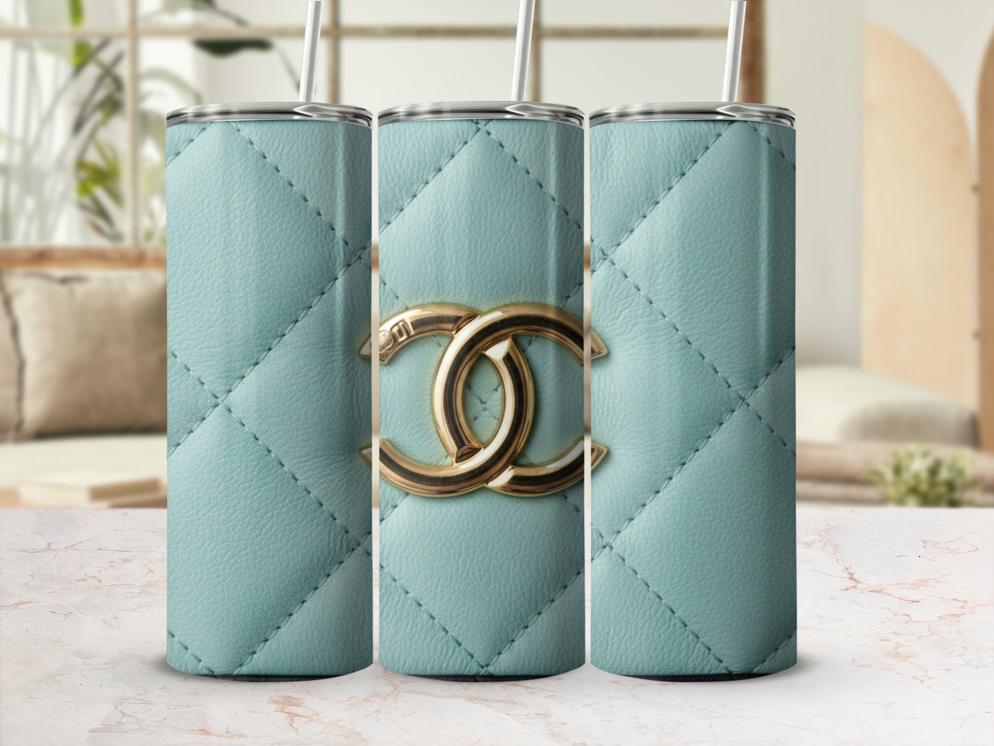 Gold Logo On Teal Quilted Surface Design Tumblers