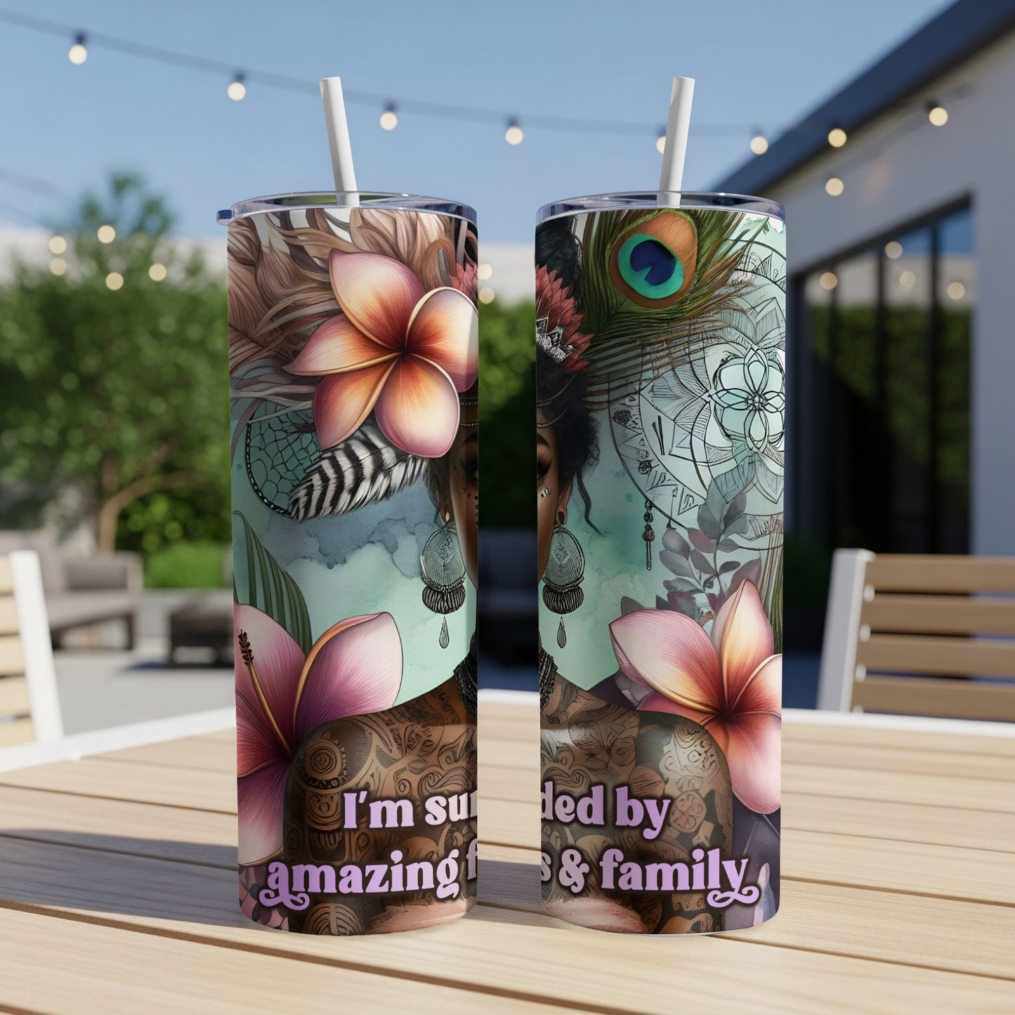 Two tumblers with floral and feather designs, featuring text.