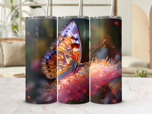 Three tumblers featuring a close-up of a monarch butterfly on a pink flower.