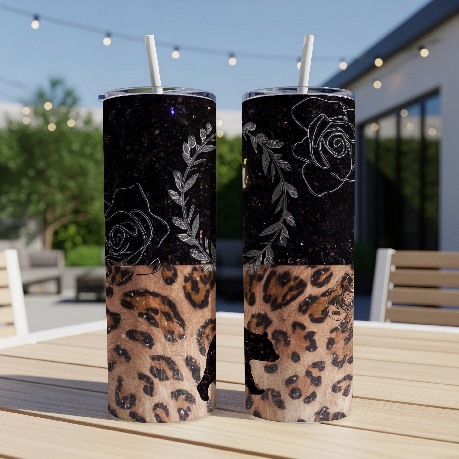 Two tumblers with floral and leopard print designs.