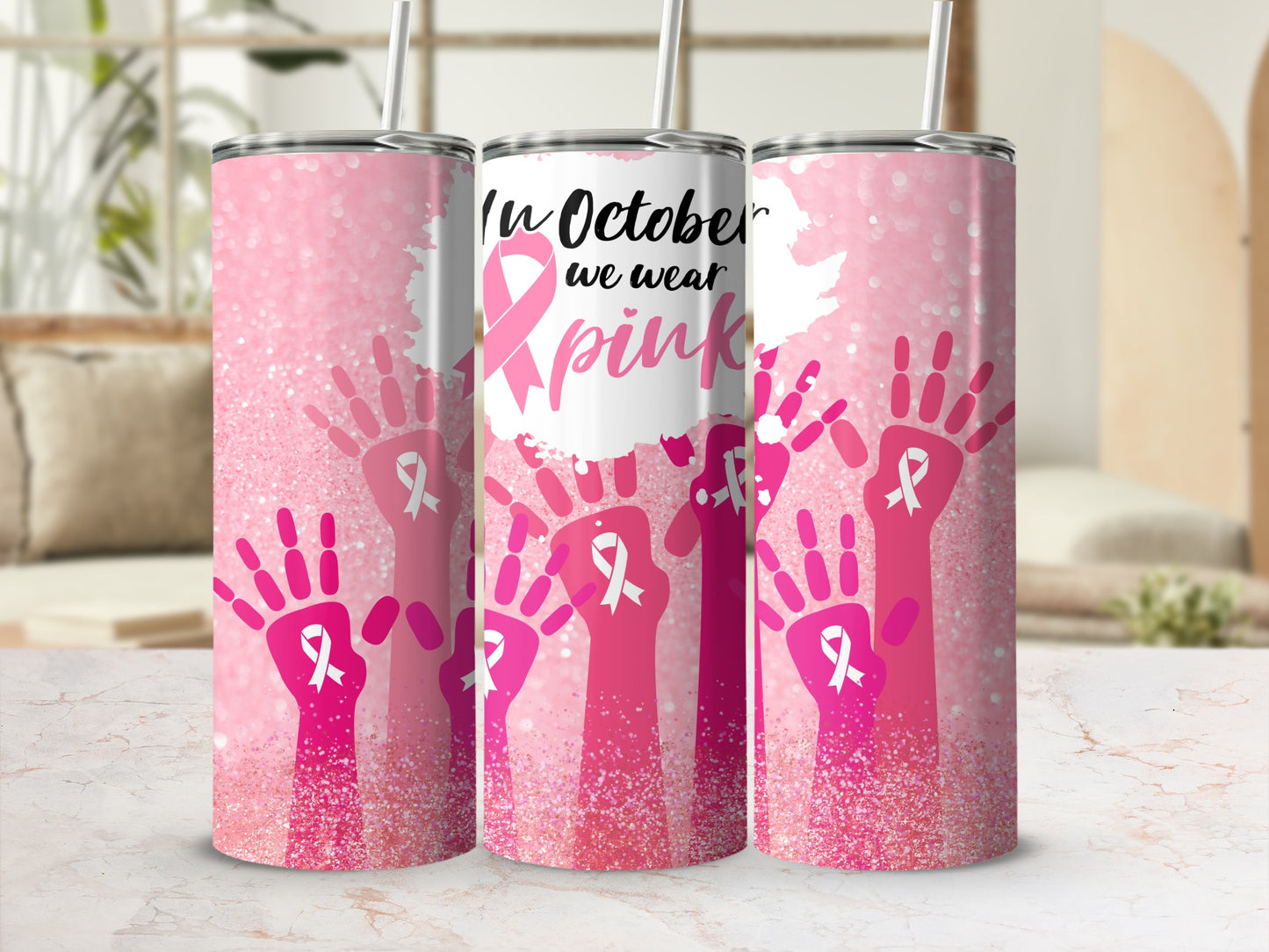 Pink glittery tumbler with hands and breast cancer ribbons, "In October we wear pink".