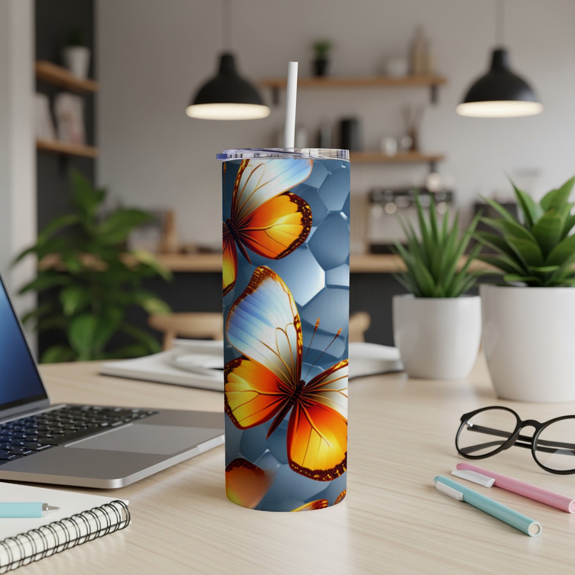 Tumbler with colorful butterflies and honeycomb pattern.