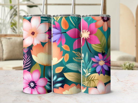 Three tall tumblers with vibrant floral patterns and straws.