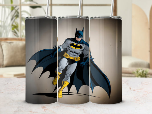 Batman superhero illustration on three tumblers against a blurred background.