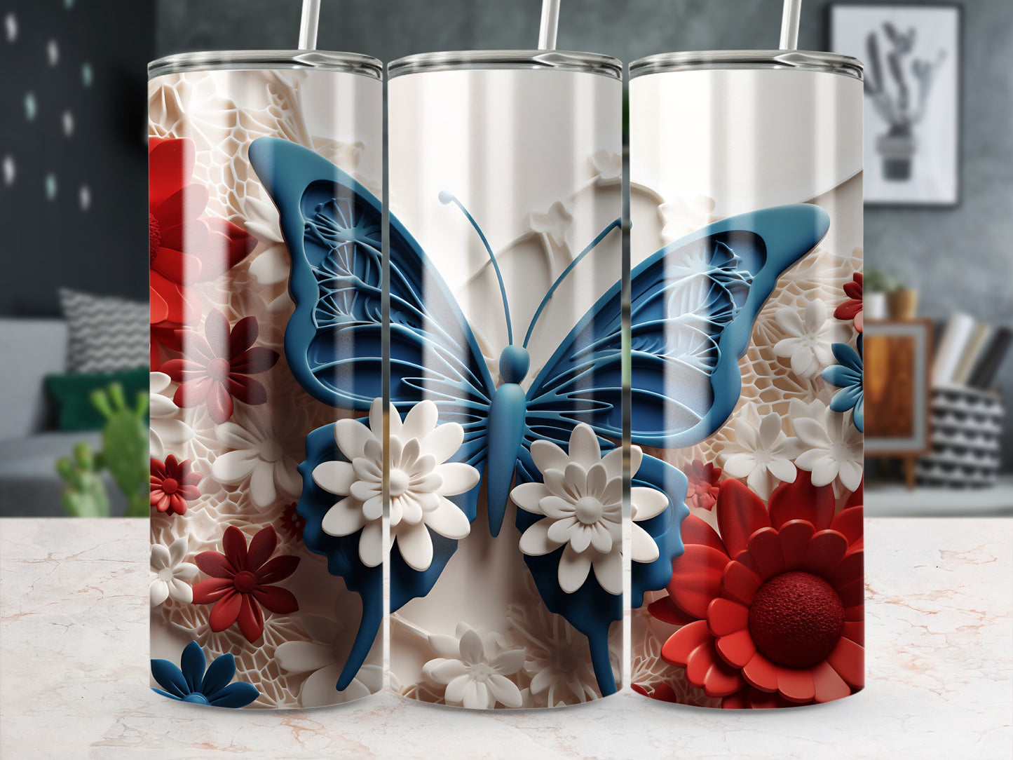 White tumbler with blue butterfly and red and white flowers.