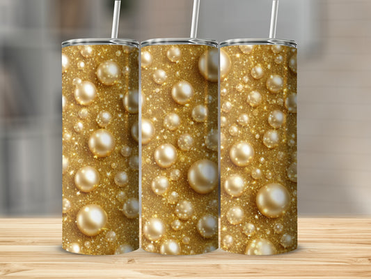 Gold glitter and pearl pattern on three tumblers.