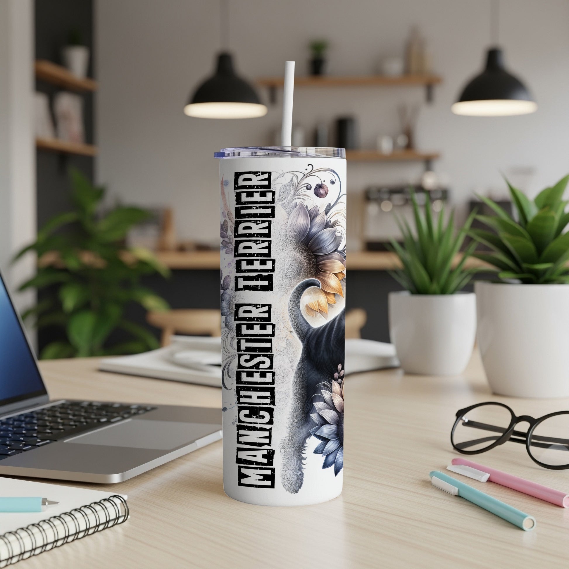 Tumbler with "Manchester Terrier" text and floral dog illustration.
