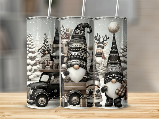 Three festive gnomes and a truck with gifts in a snowy woodland scene.
