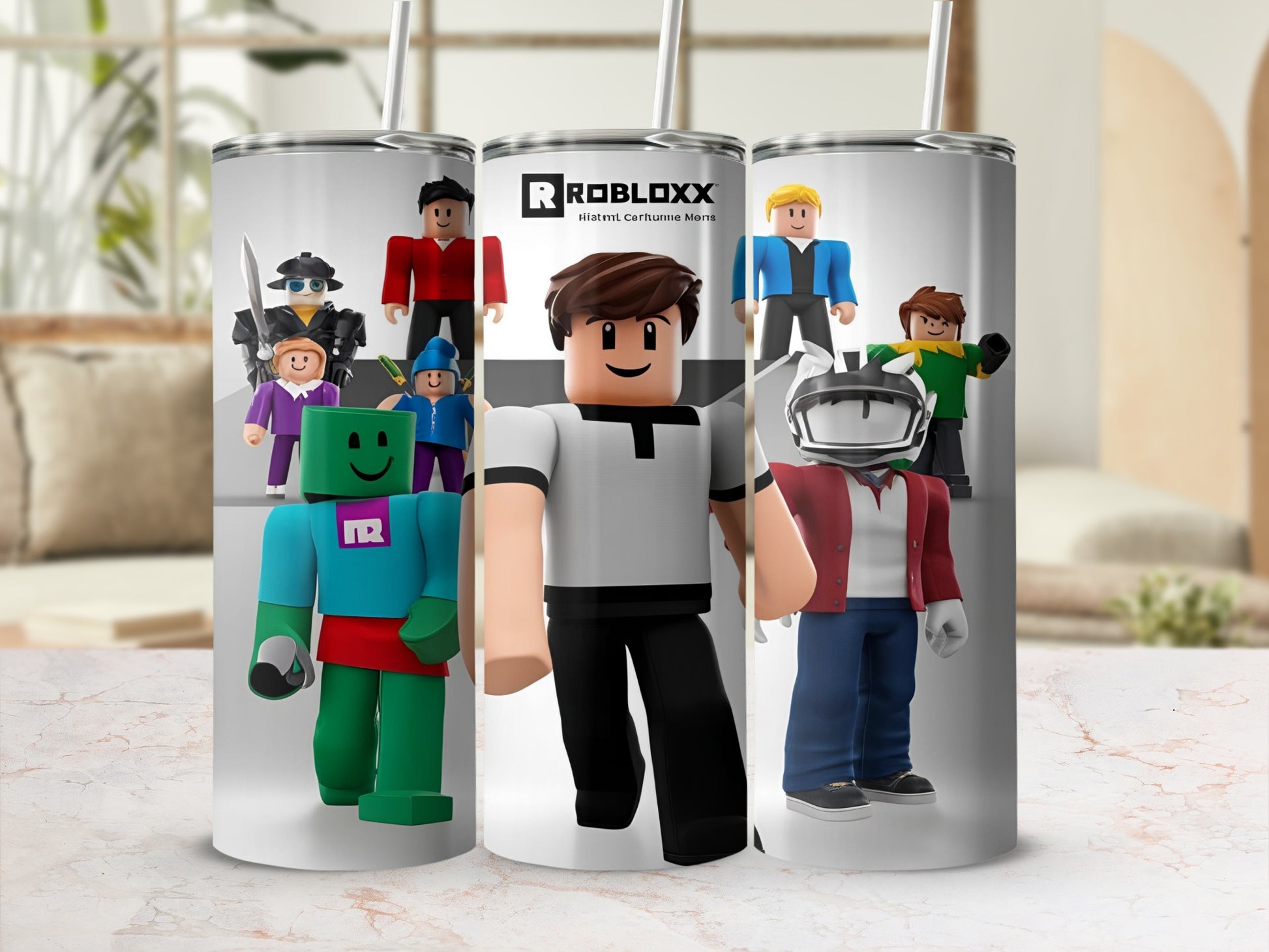 Roblox characters and logo on a silver tumbler with straws.