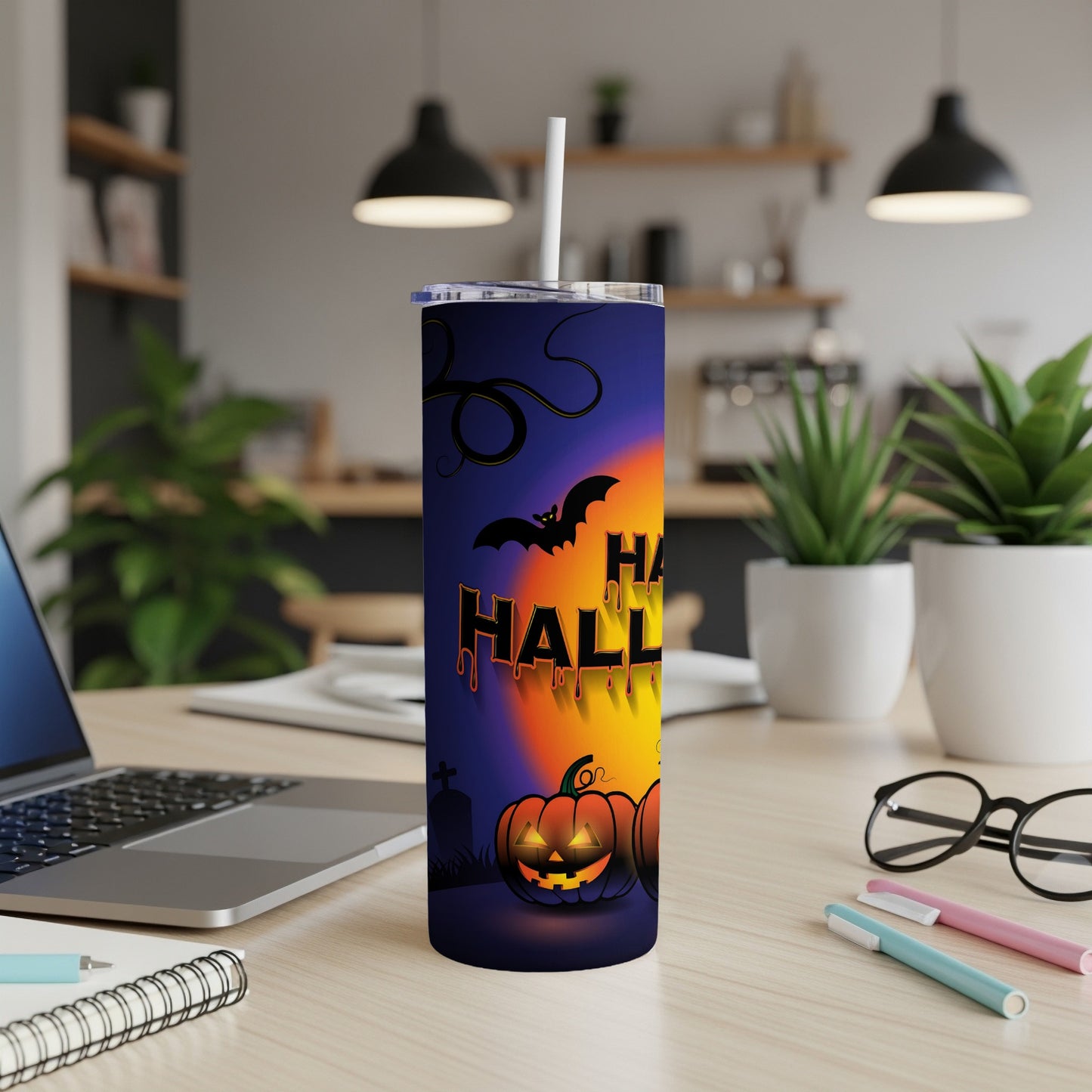 Halloween tumbler with pumpkins, bat, and dripping text in a dark, gradient background.