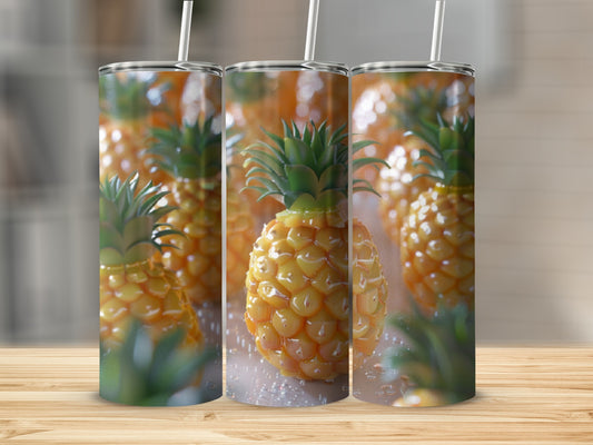 Three tumblers with a pineapple pattern on a wooden surface.
