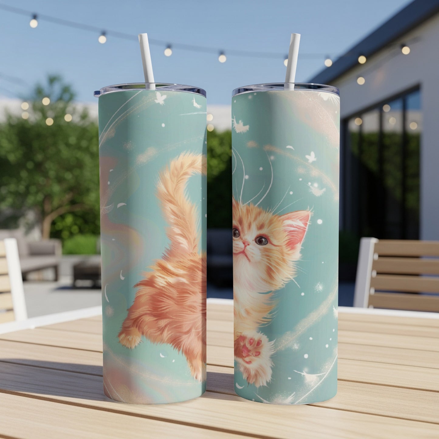 Two skinny tumblers with a fluffy orange kitten and pale blue background.