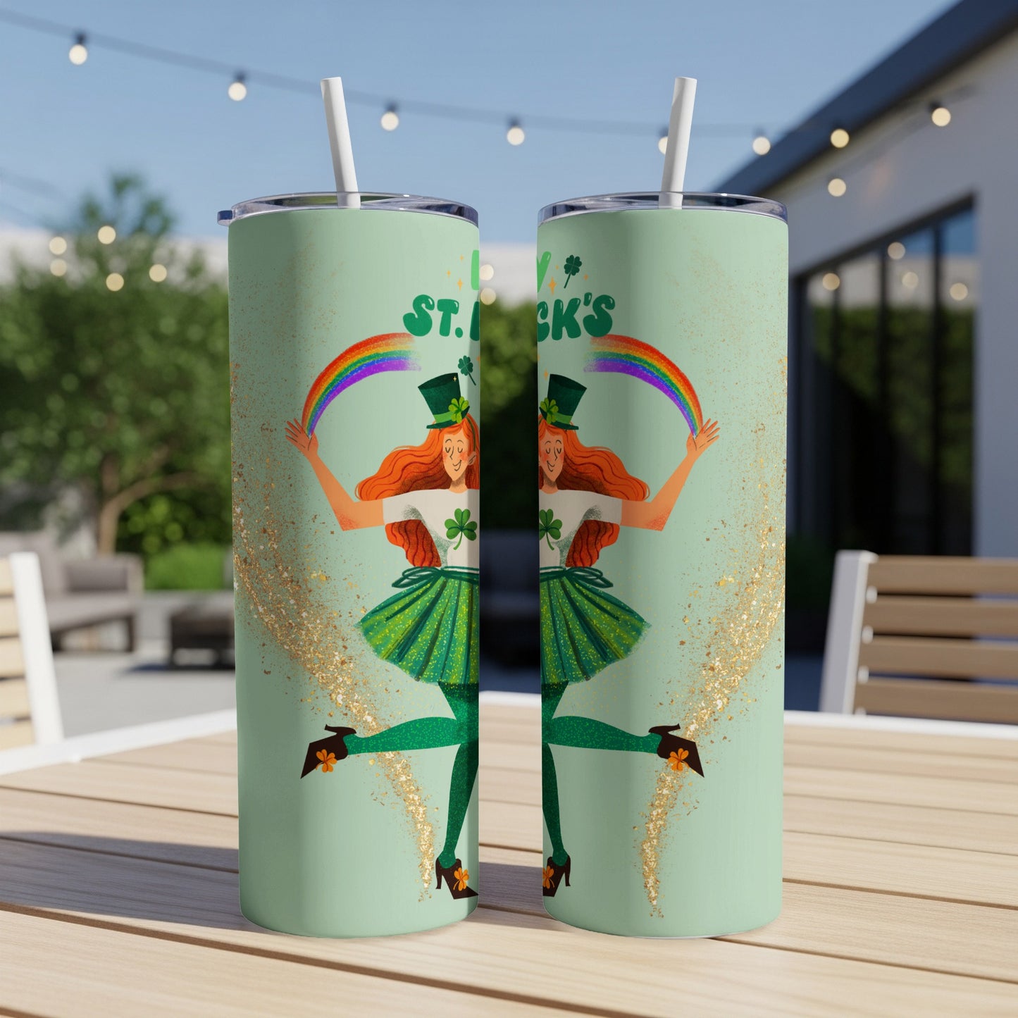 Two mint green tumblers with St. Patrick's Day graphic of a dancing leprechaun.