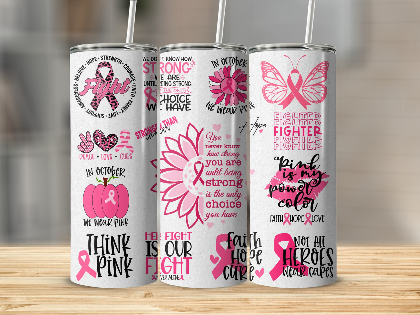 Pink tumblers with inspirational quotes and graphics for breast cancer awareness.