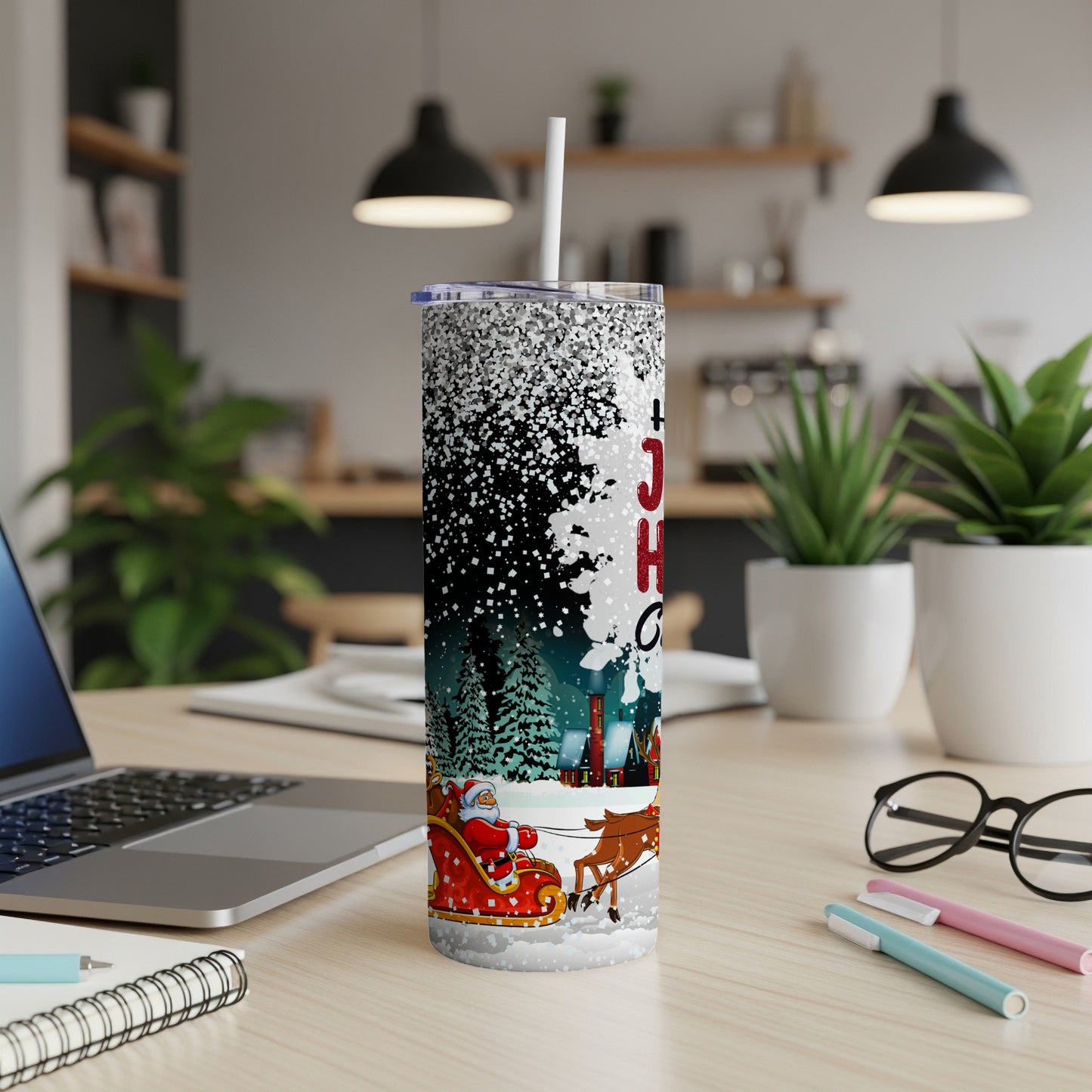Glittery Christmas tumbler with Santa in sleigh and festive village design.