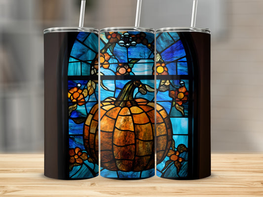 Stained glass pumpkin design on a tumbler with a straw.