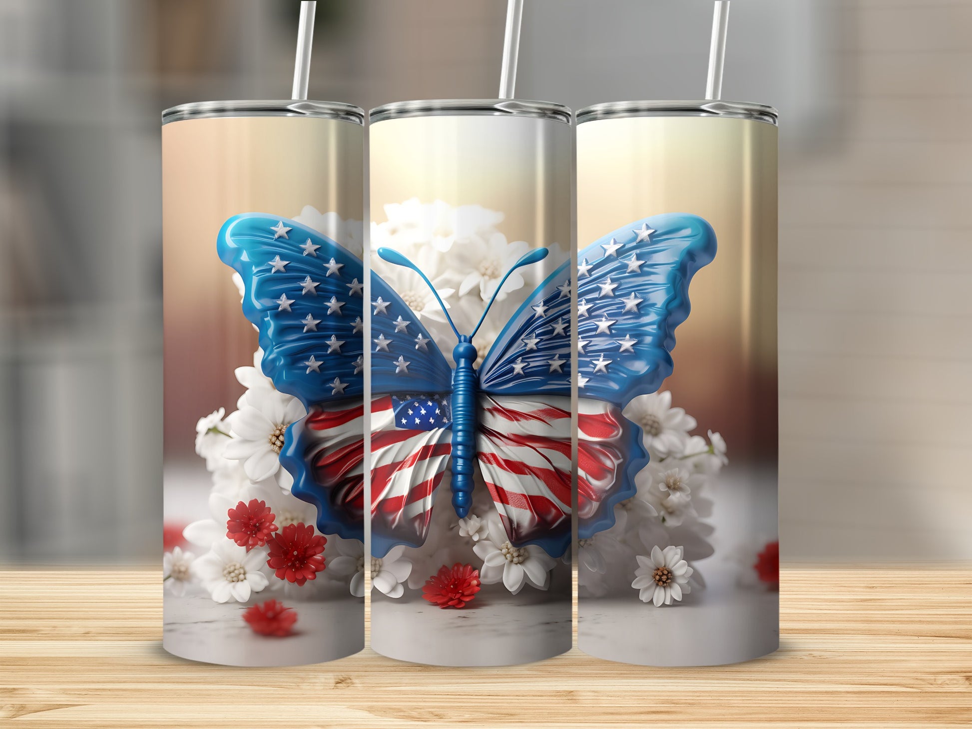 Three tumblers with American flag butterfly design on white flowers.