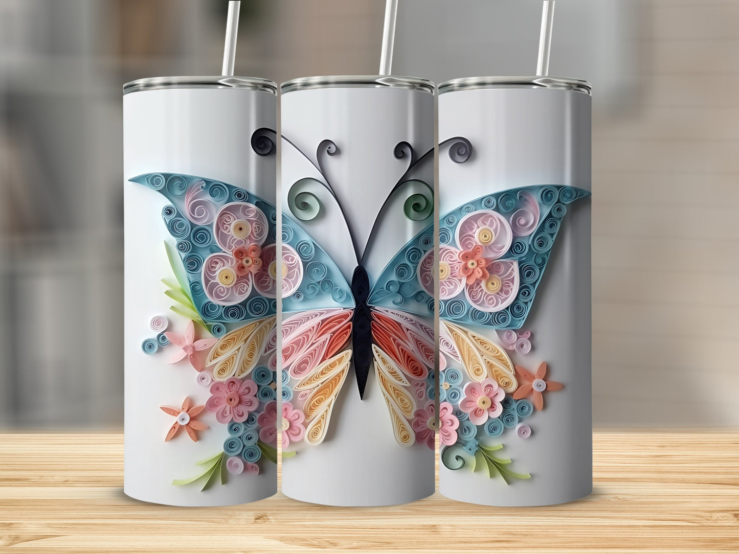 Three white tumblers featuring a colorful quilled butterfly and floral design.