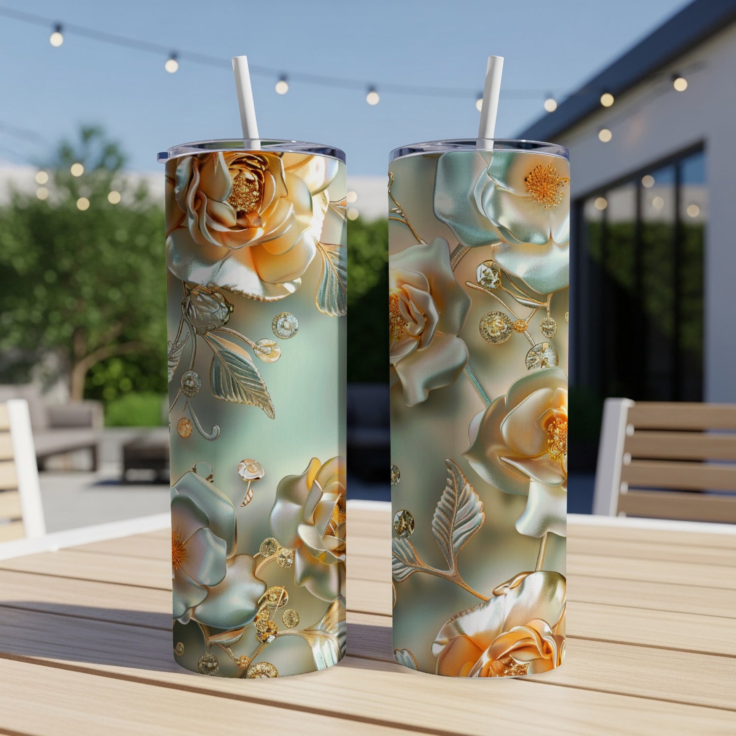 Two tall, slender tumblers with a floral rose and jewel design.