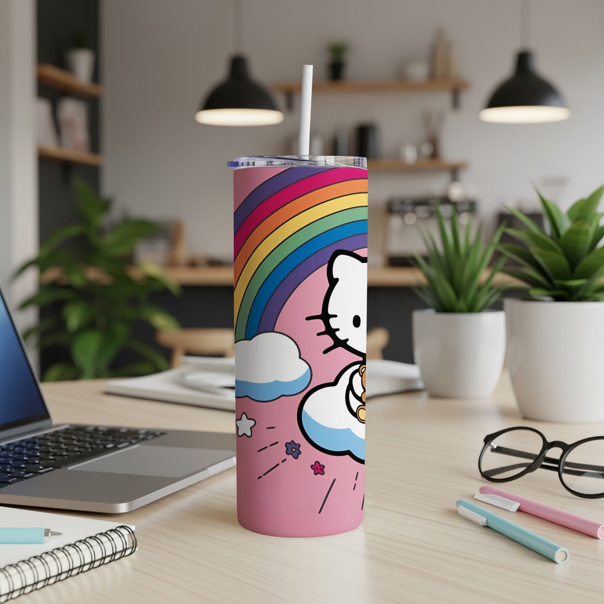 Hello Kitty on a rainbow cloud on a pink tumbler with a straw.