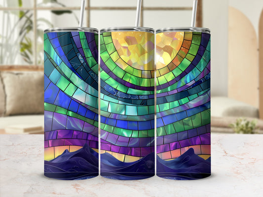 Three tumblers with a stained-glass mountain and sun design.