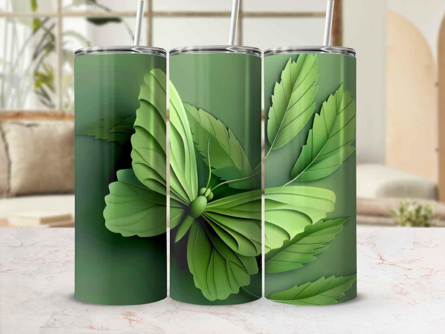 Green tumbler with butterfly and leaf design.