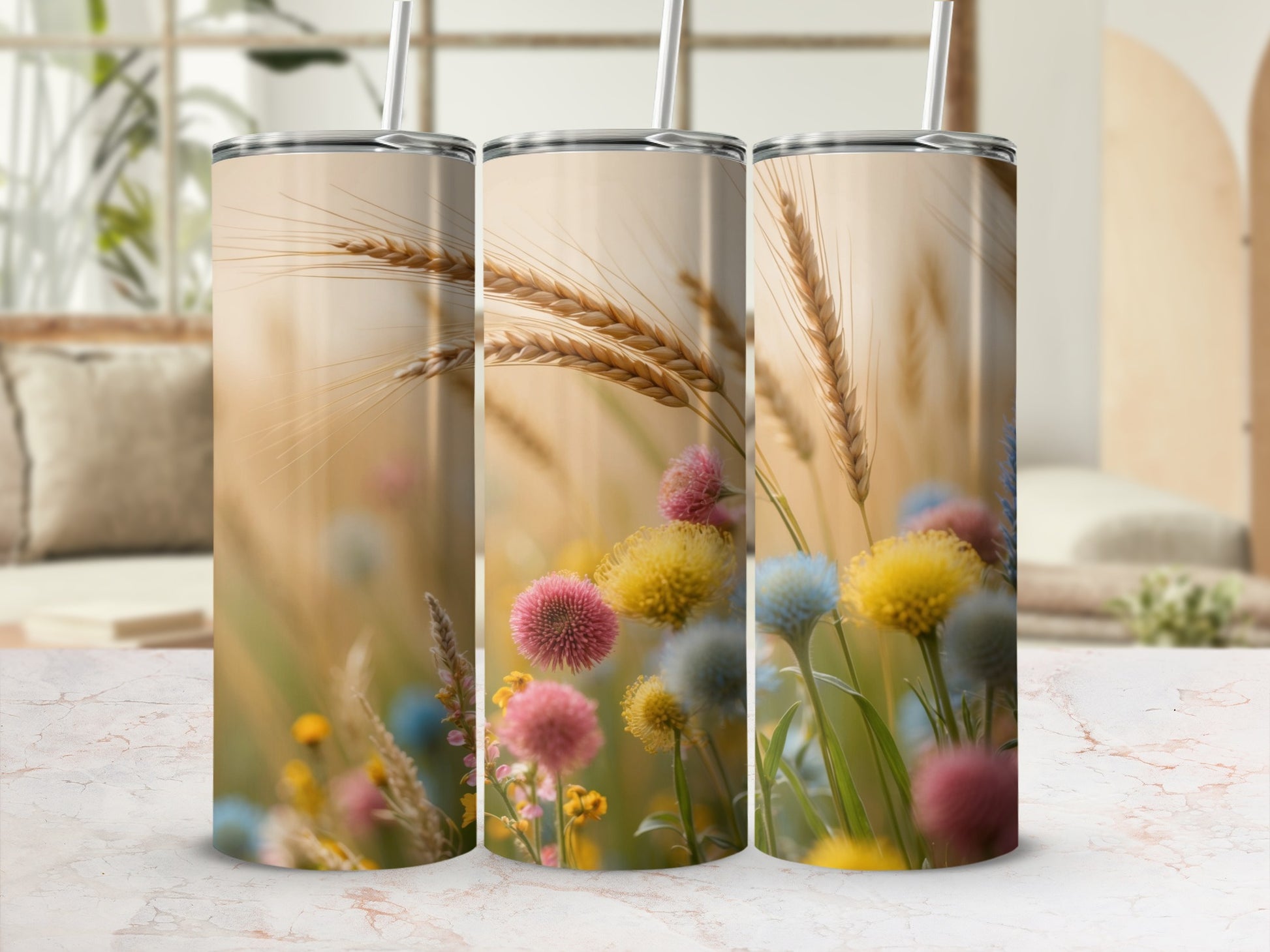 Three tumblers with floral and wheat field design.