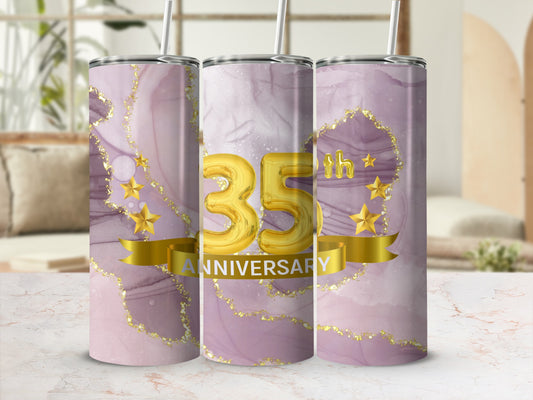 Tumbler with "35th Anniversary" text, gold stars, and marbled purple design.