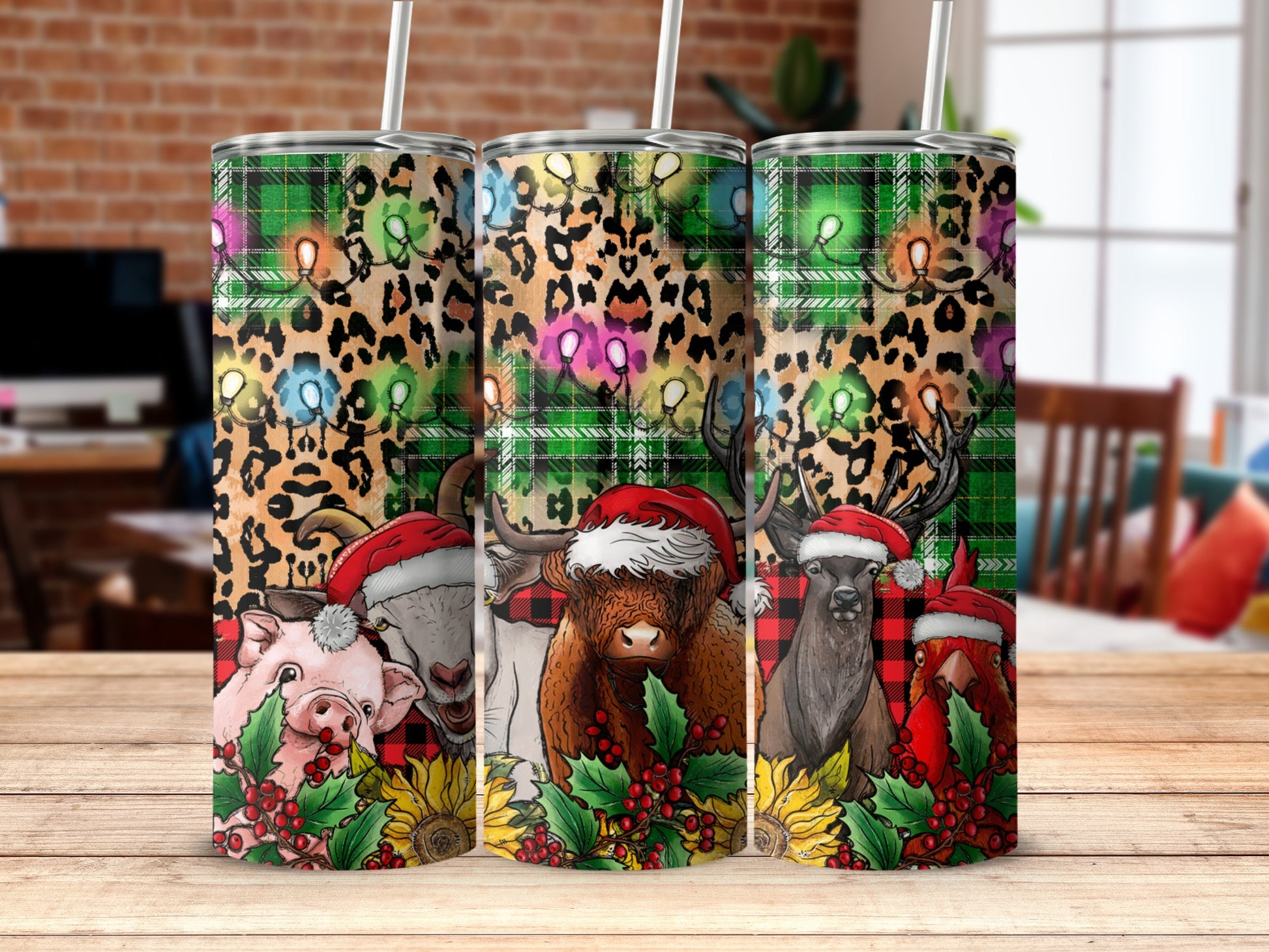 Tartan plaid tumblers with holiday animals, Santa hats, sunflowers, and lights.