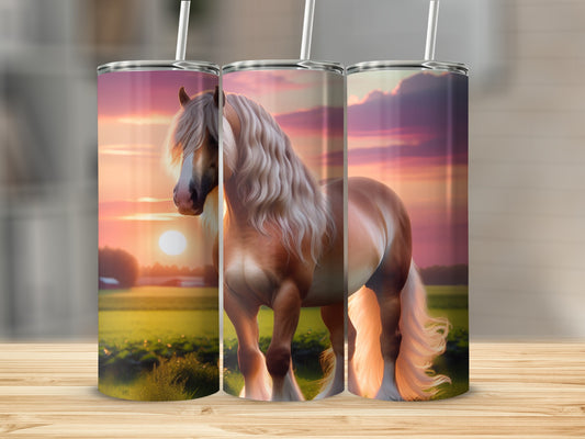 Golden horse with flowing mane stands in a sunset field.