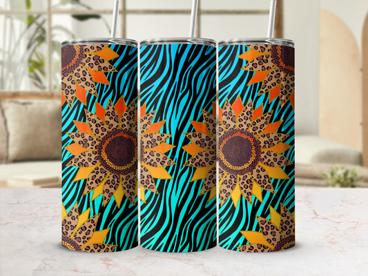 Three tumblers with sunflower and animal print designs on a black and turquoise background.