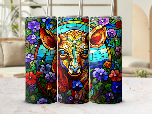 Triptych of tumblers featuring stained-glass style cow head surrounded by colorful flowers.