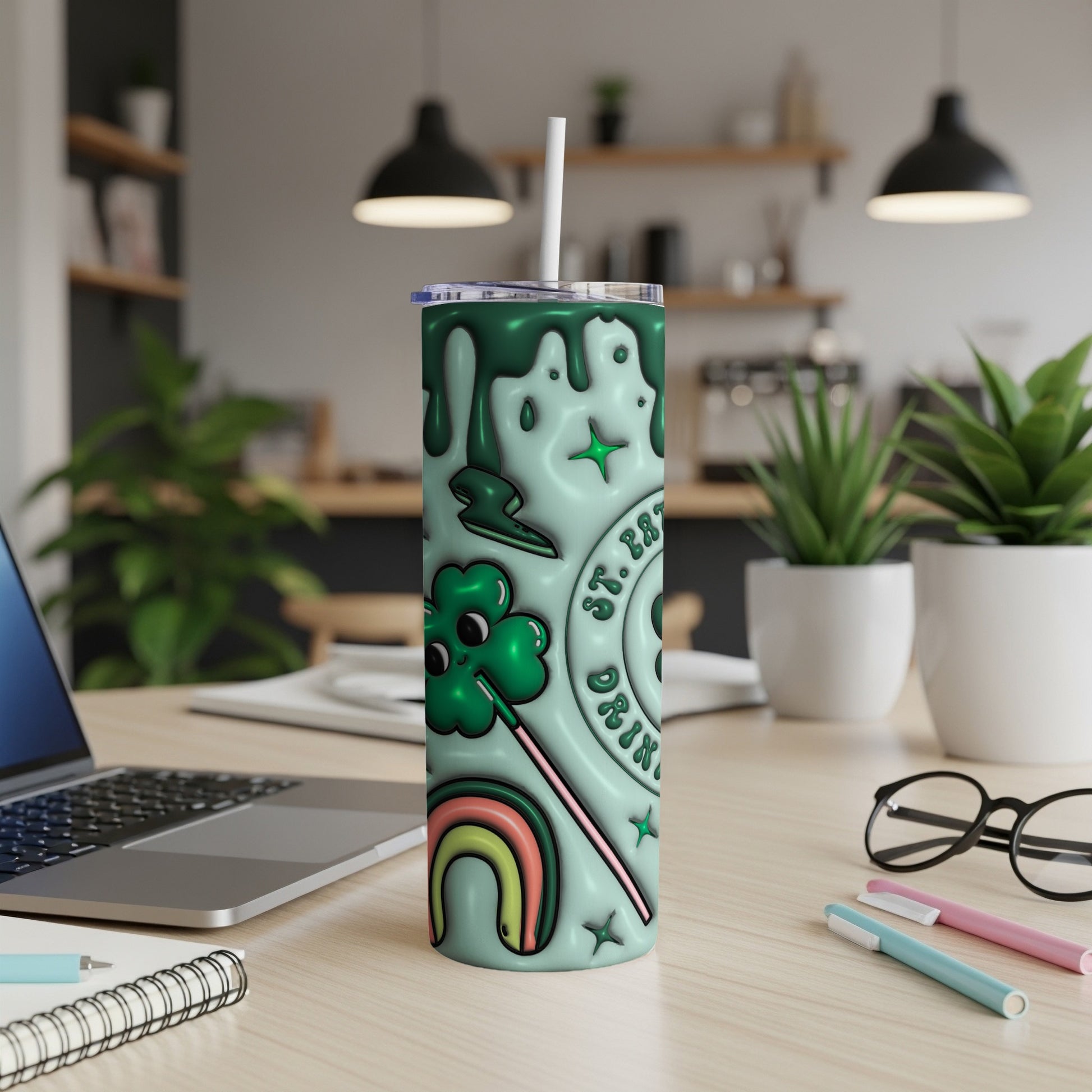 Green tumbler with St. Patrick's Day themed illustrations and text.