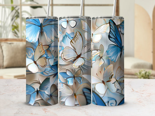 Three tumblers with a blue and gold butterfly design.