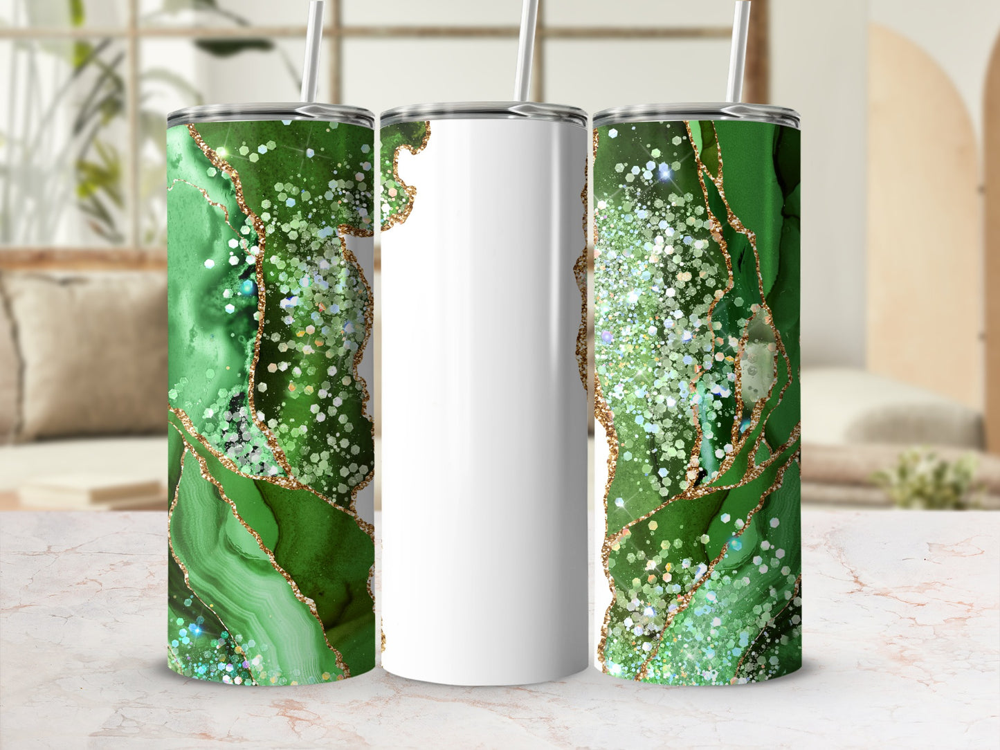 Three tumblers with green, white, and gold abstract marble and glitter design.
