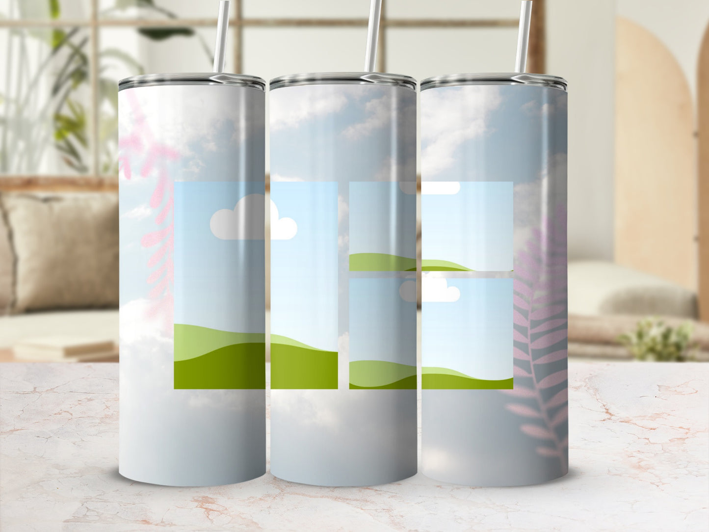 Three tumblers with sky, clouds, and rolling green hills design.