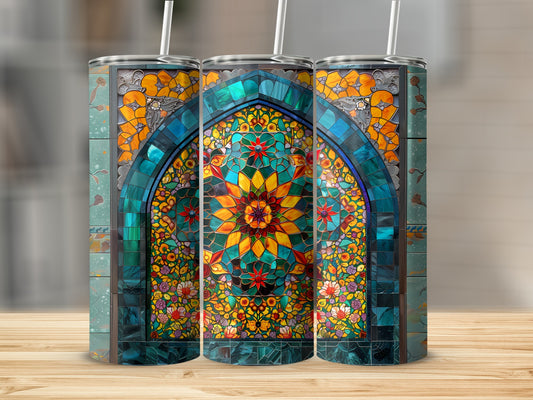 Three tumblers with stained glass floral arch designs on a wooden surface.