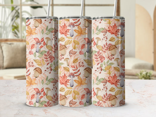 Autumn leaves and mushroom pattern on three reusable tumblers.