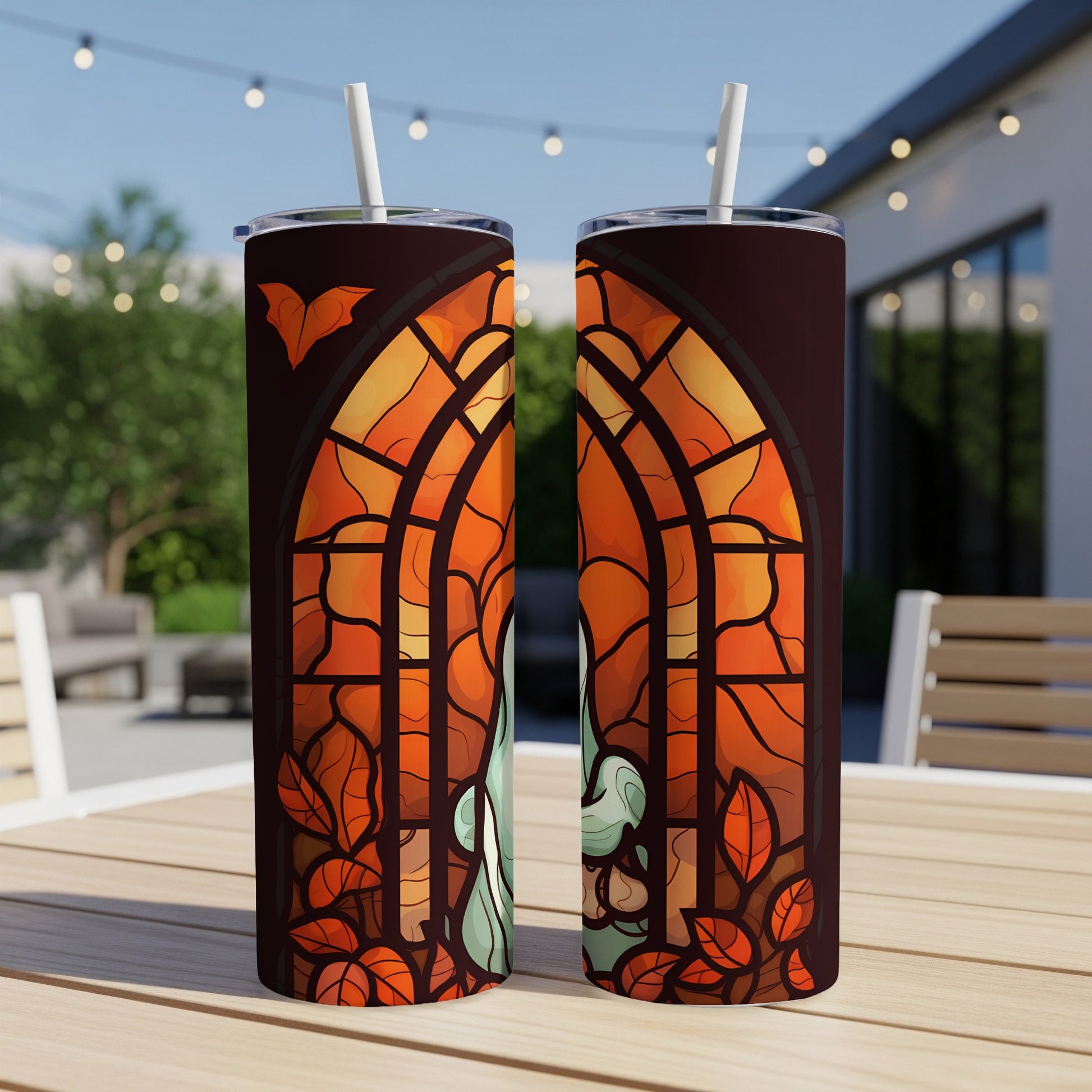 Two tumblers featuring stained glass with a ghost and bats.