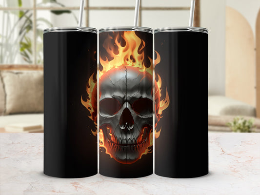 Black tumbler with flaming skull graphic in center.