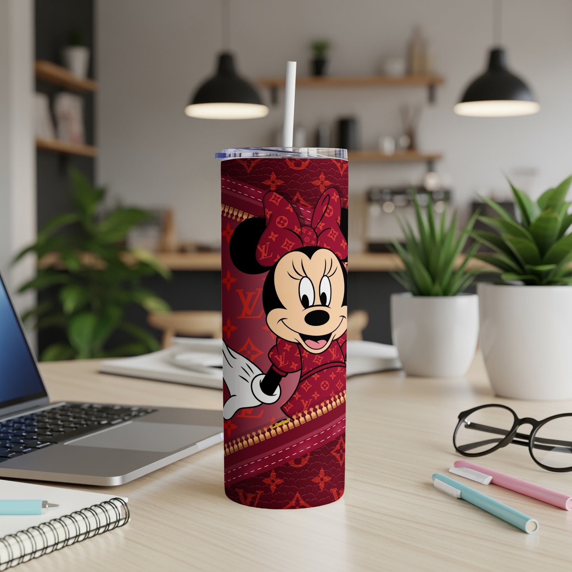 Minnie Mouse on a burgundy tumbler with a repeating Louis Vuitton pattern.