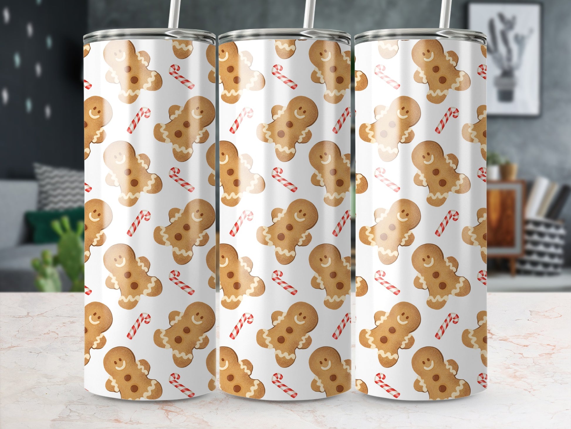 Gingerbread man and candy cane pattern on white tumbler with straw.