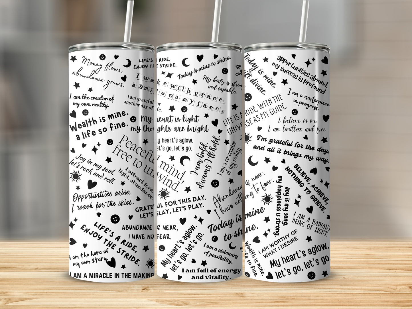 Tumbler with affirmations about abundance, joy, and self-creation.
